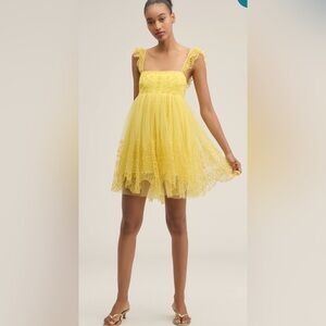 NWT Anthropologie Let Me Be Minikleid aus Tüll mit Lochstickerei yellow size S